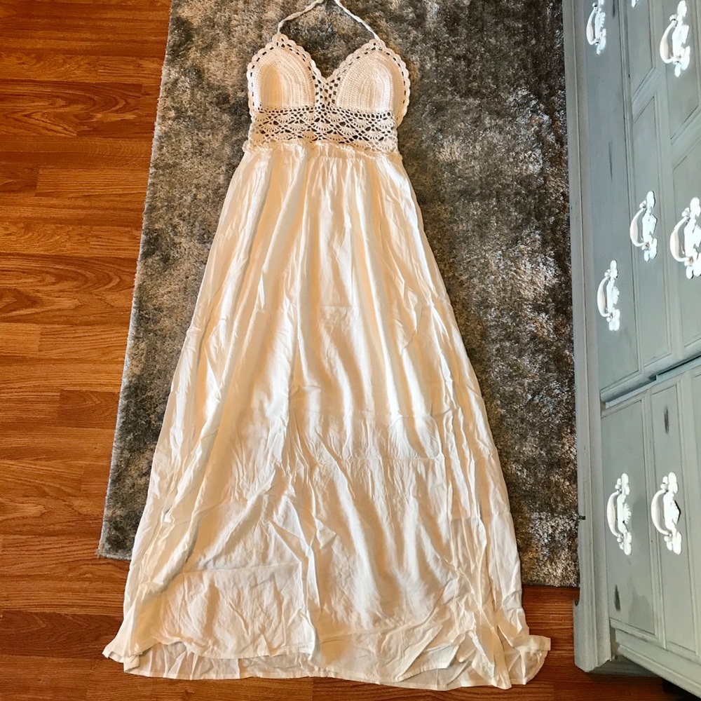 Crochet halter top backless white dress.